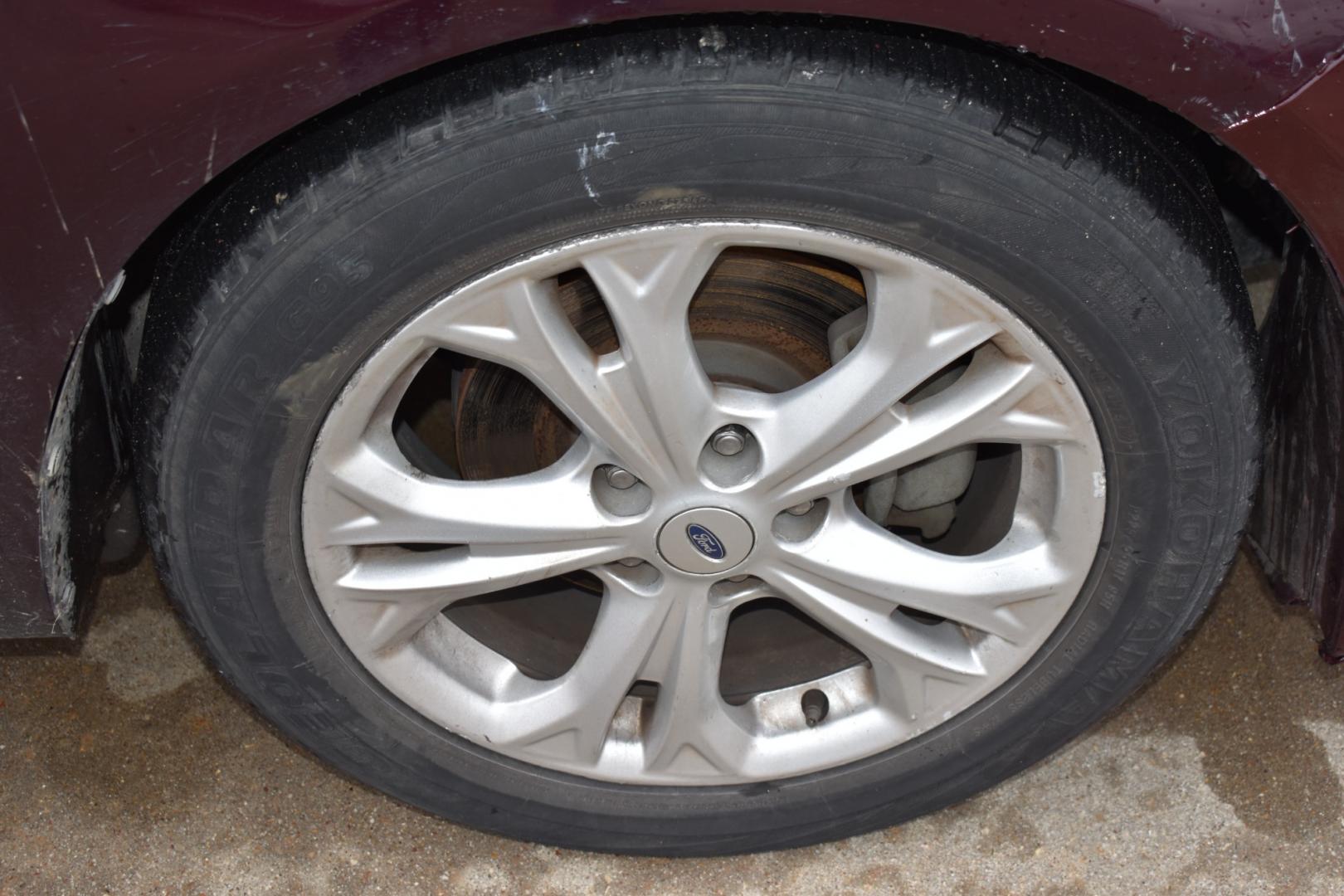 2012 Red /Gray Ford Fusion SE (3FAHP0HA0CR) with an 2.5L L4 DOHC 16V engine, 6 Speed AUTOMATIC transmission, located at 5925 E. BELKNAP ST., HALTOM CITY, TX, 76117, (817) 834-4222, 32.803799, -97.259003 - Photo#25